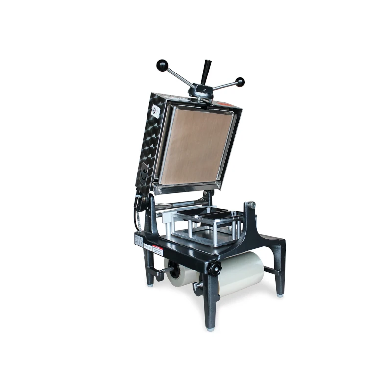 Compact Model II Tray sealer.